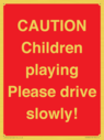caution-children-playing-please-drive-slowly~